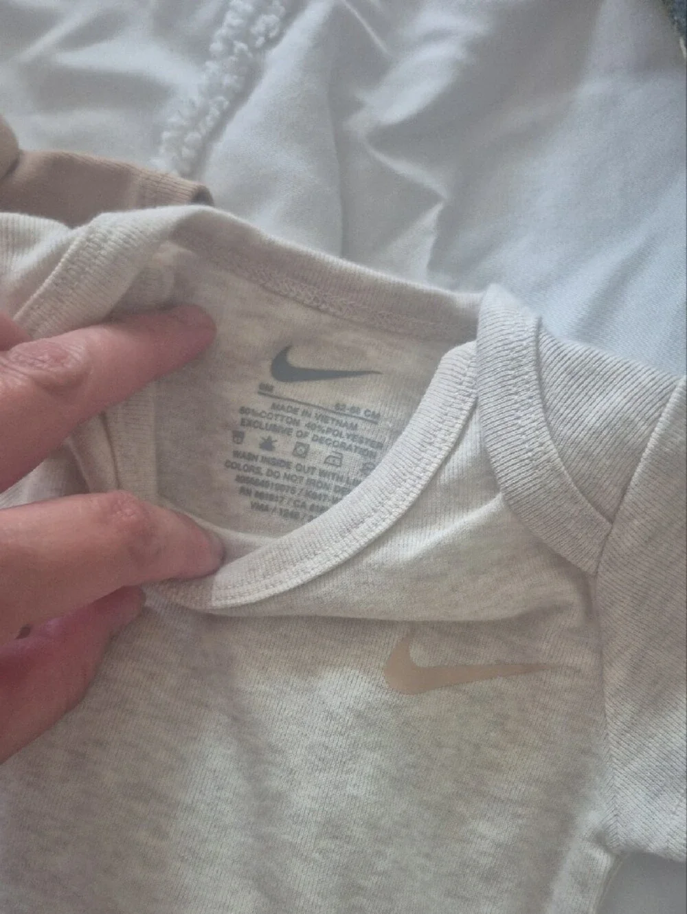 Nike Kids One-Piece Bodysuits in White, Beige, and Tan - Trio Pack